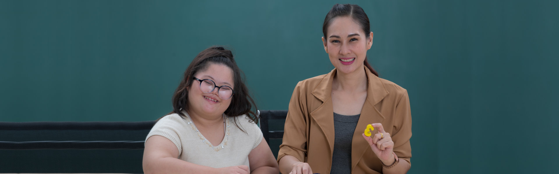 two young woman smiling